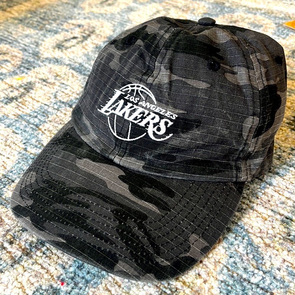 Laker camo hat. Velcro adjustable hat. Brand new never worn.